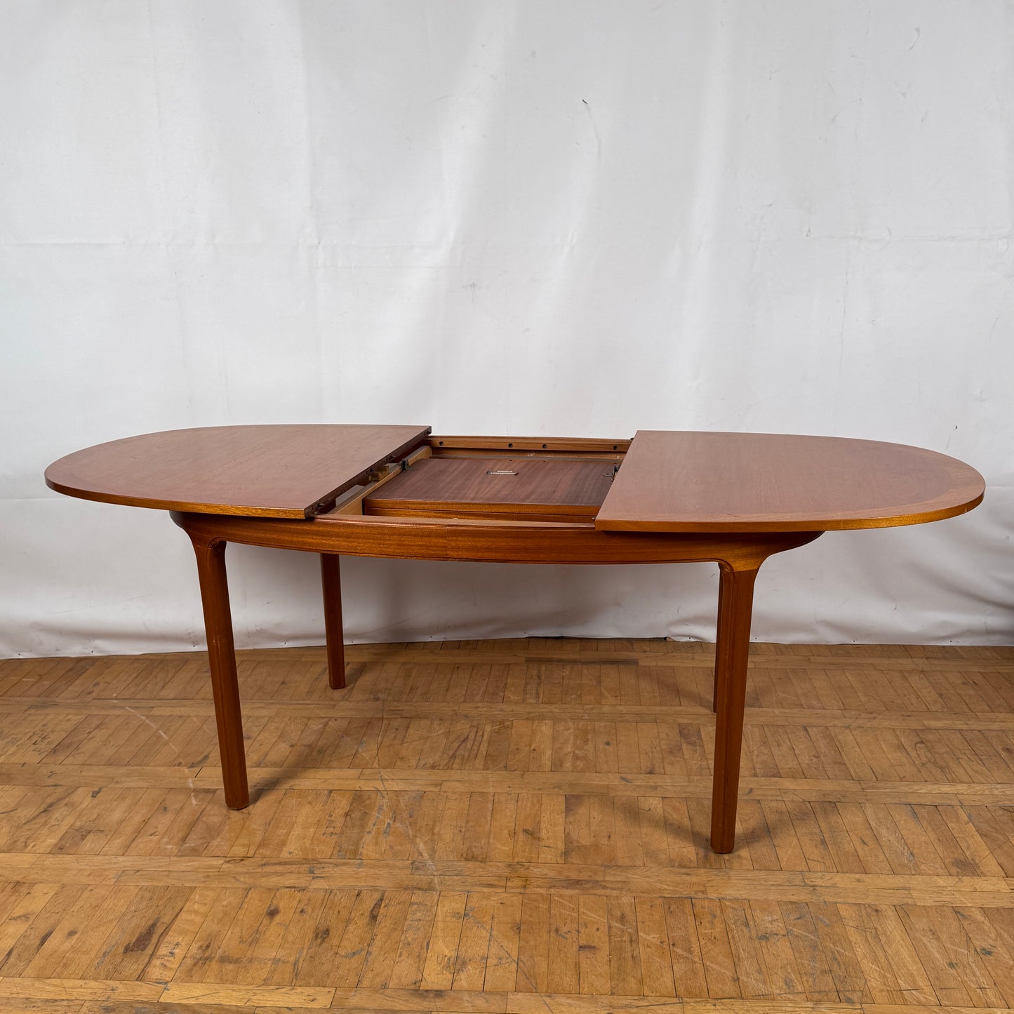 Vintage Nathan Oval Teak Dining Table with Butterfly Extension, 1970s — Mid-Century Modern