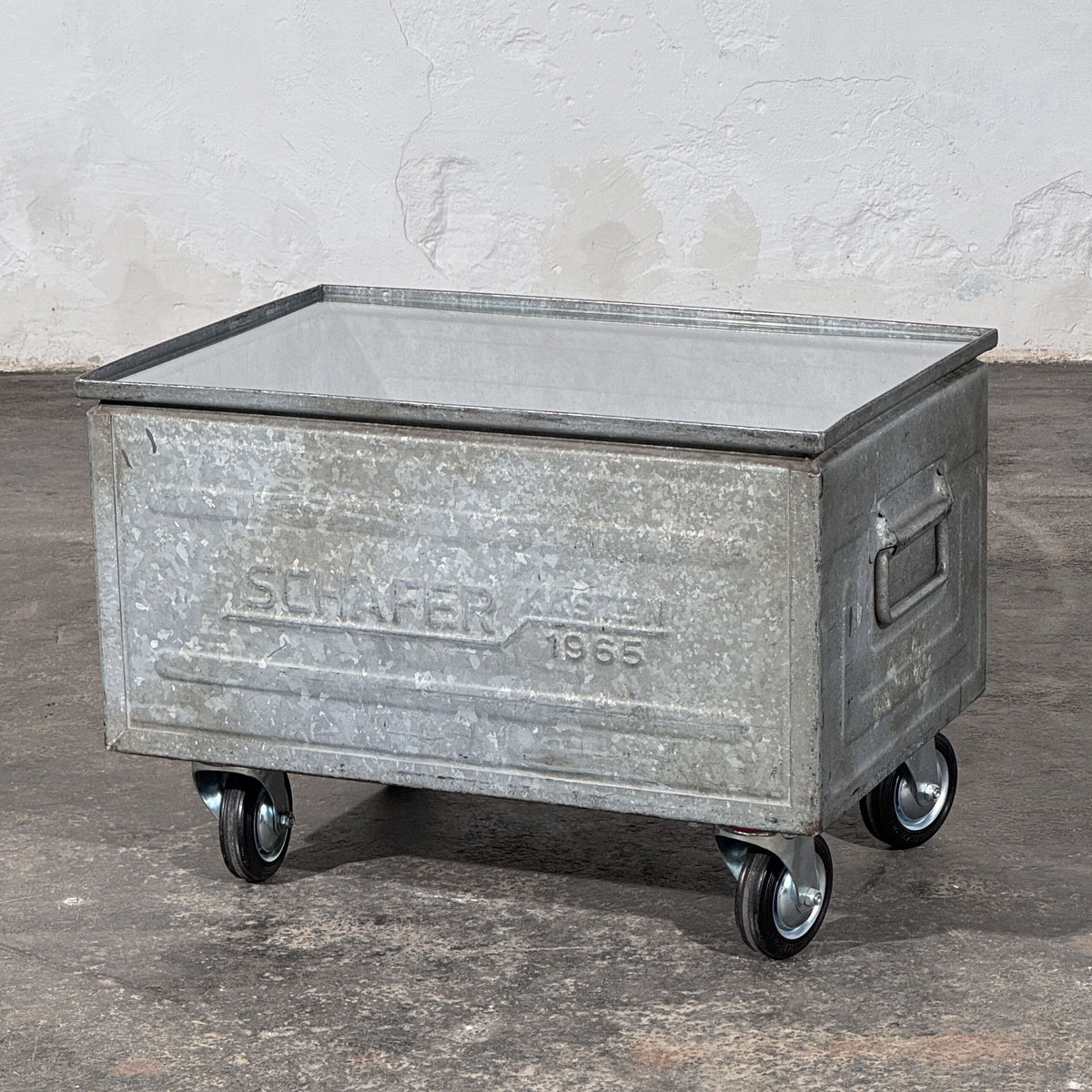 Industrial Metal Crate Coffee Table with Glass Top and Wheels, Schäfer Crate Dated 1965