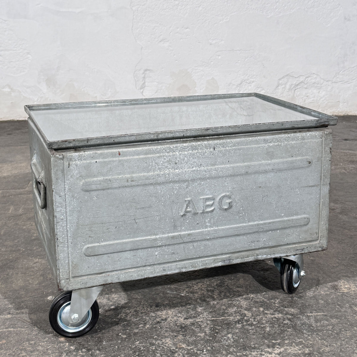 Industrial Metal Crate Coffee Table with Glass Top and Wheels, Schäfer Crate Dated 1965