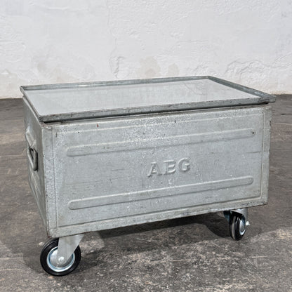 Industrial Metal Crate Coffee Table with Glass Top and Wheels, Schäfer Crate Dated 1965
