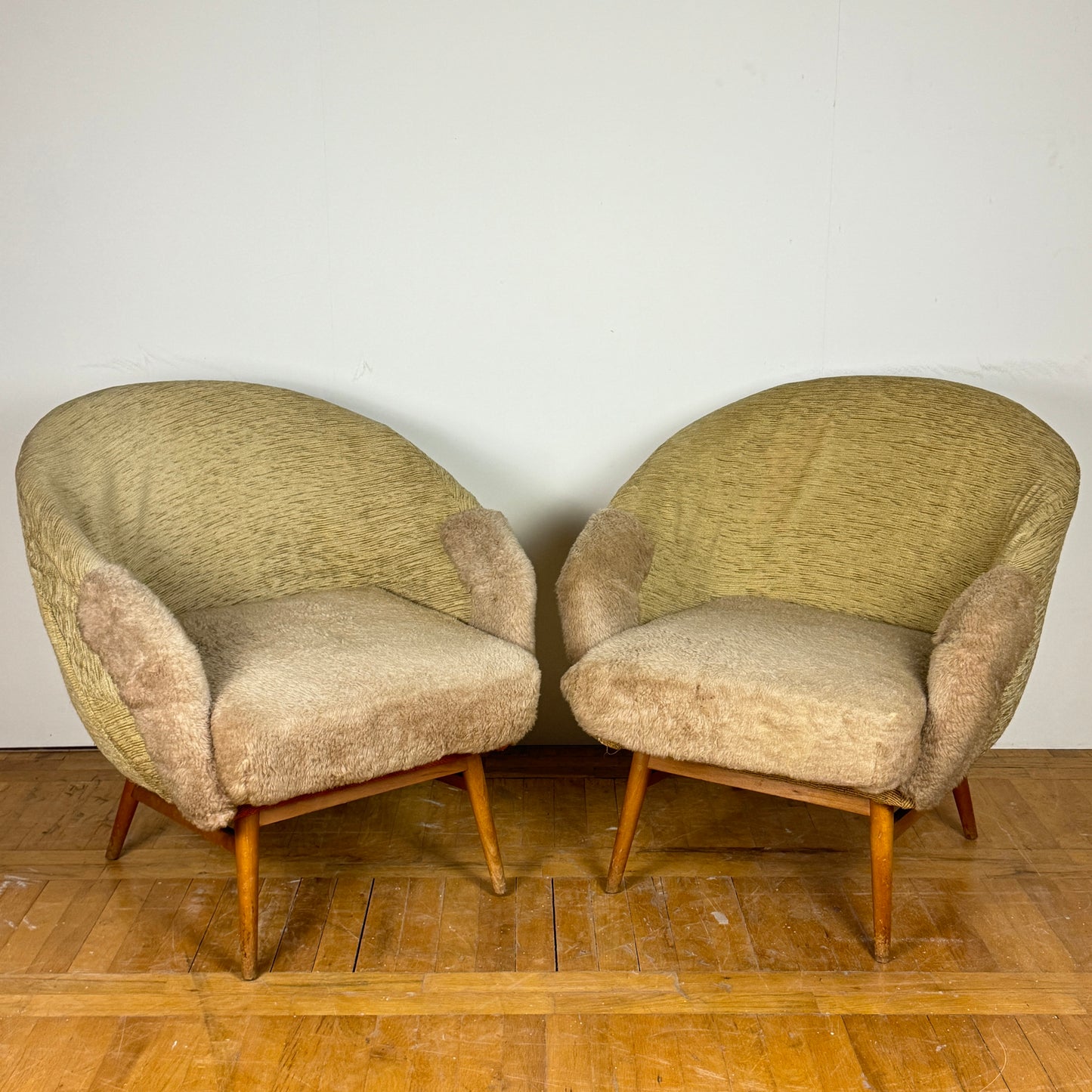 Pair of mid-century Hungarian "Judit" club chairs